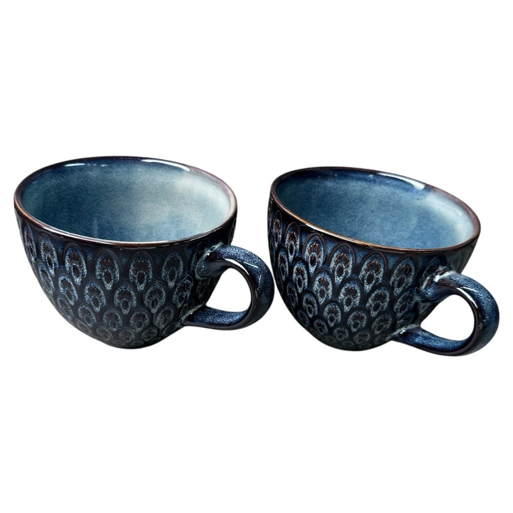 Ceramic peacock design coffee cups.
